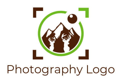 photography logo mountains behind deer
