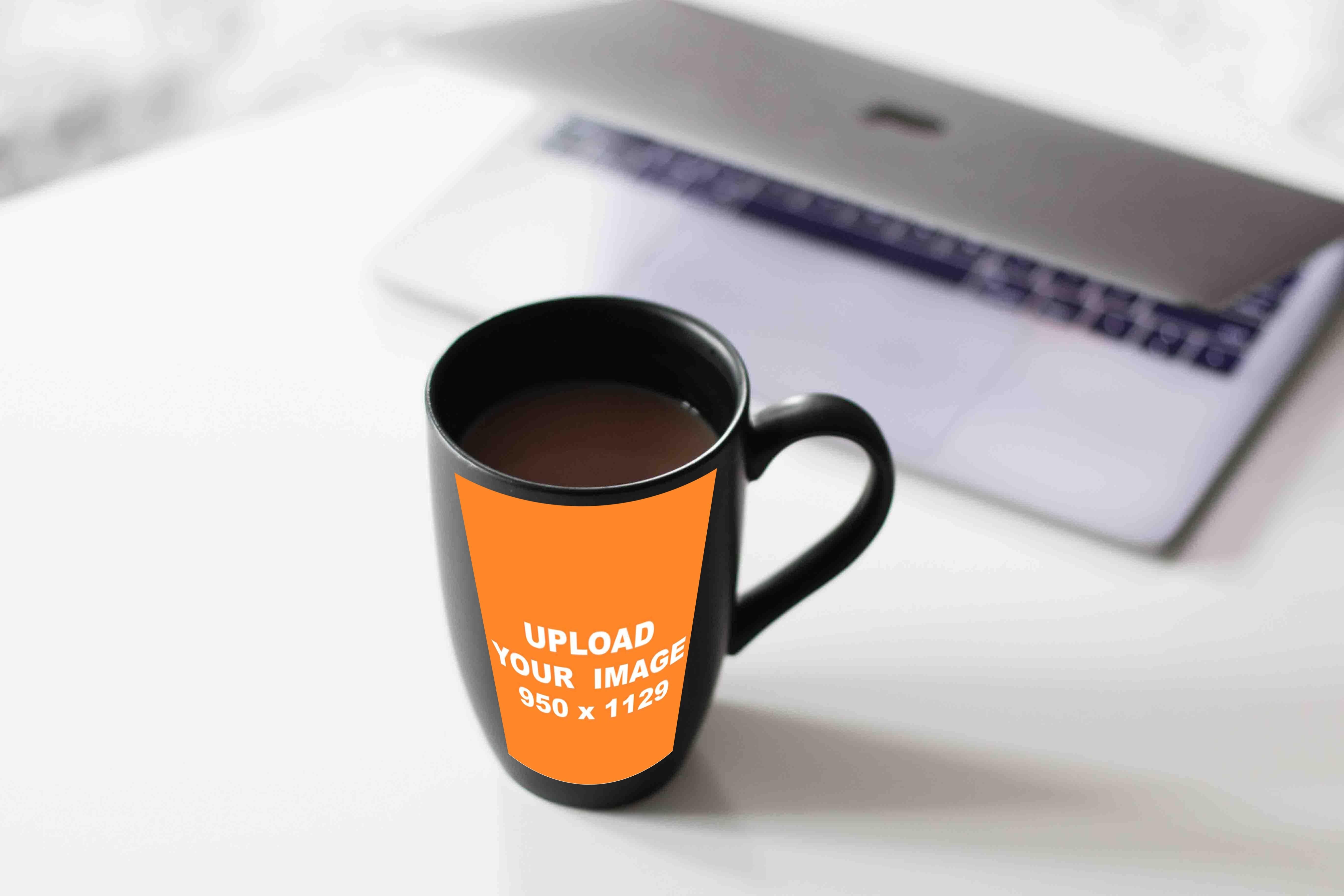 black ceramic mug filled with coffee