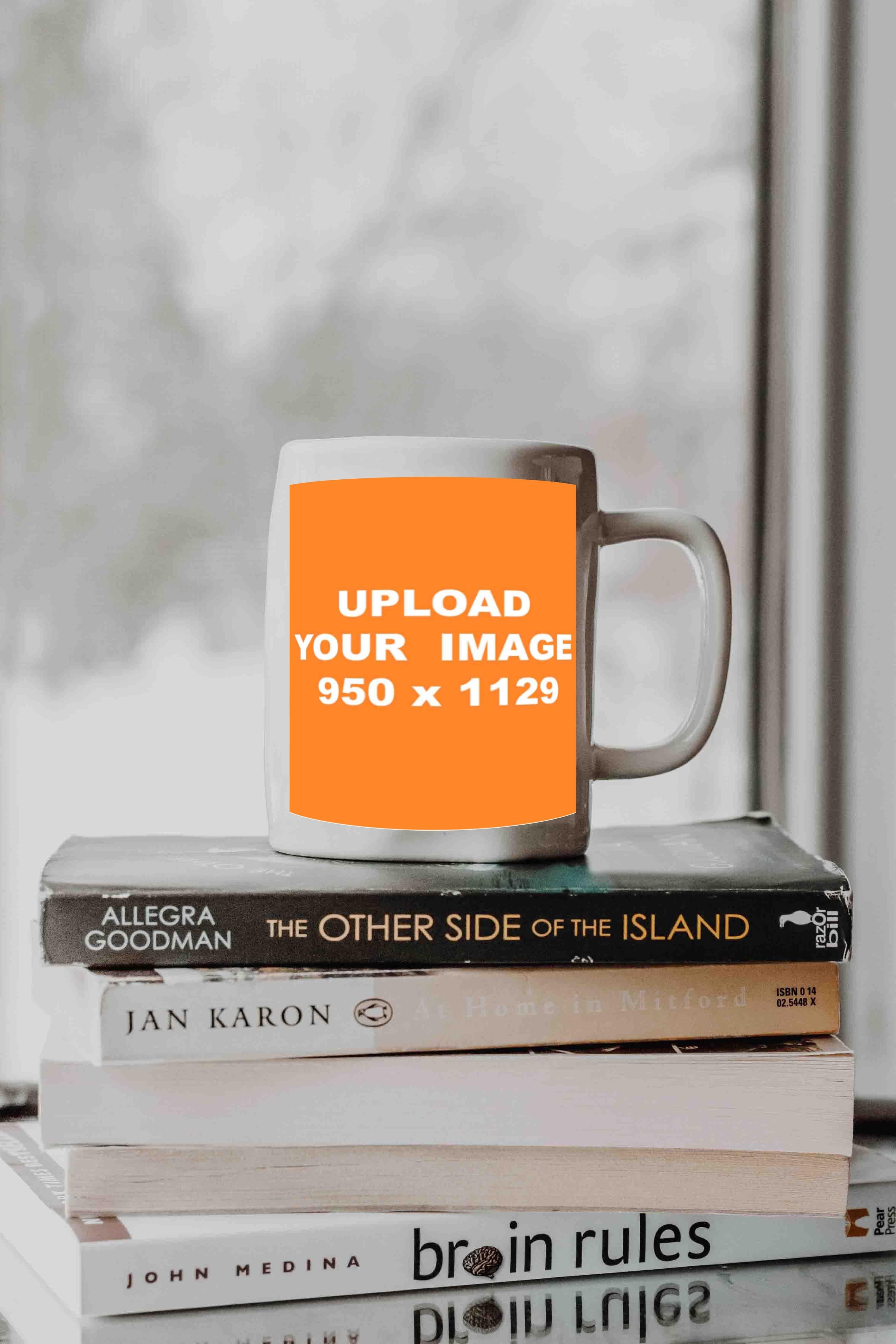 mockup builder of white mug on books