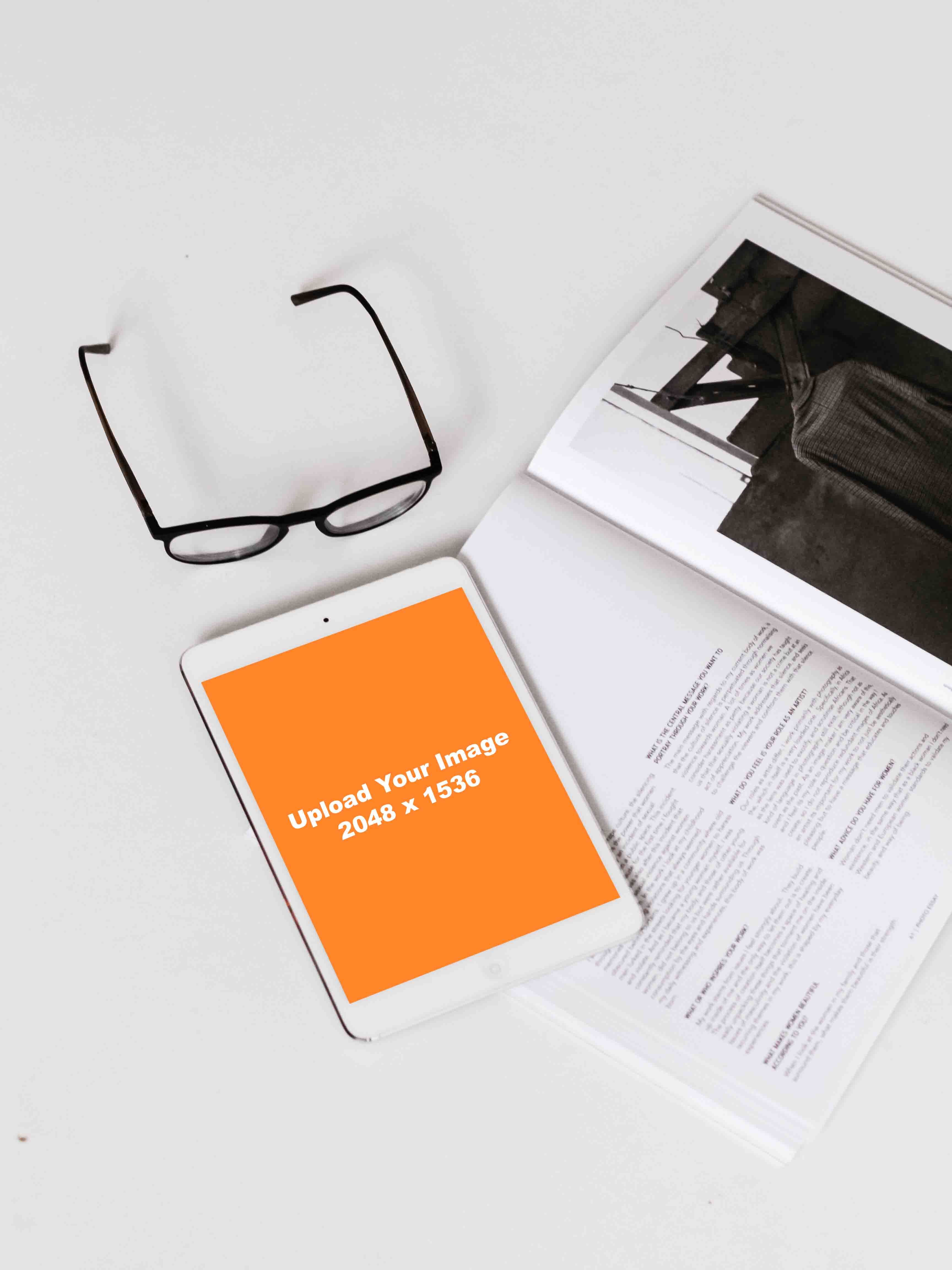 eye glasses with black frames and white iPad mockup