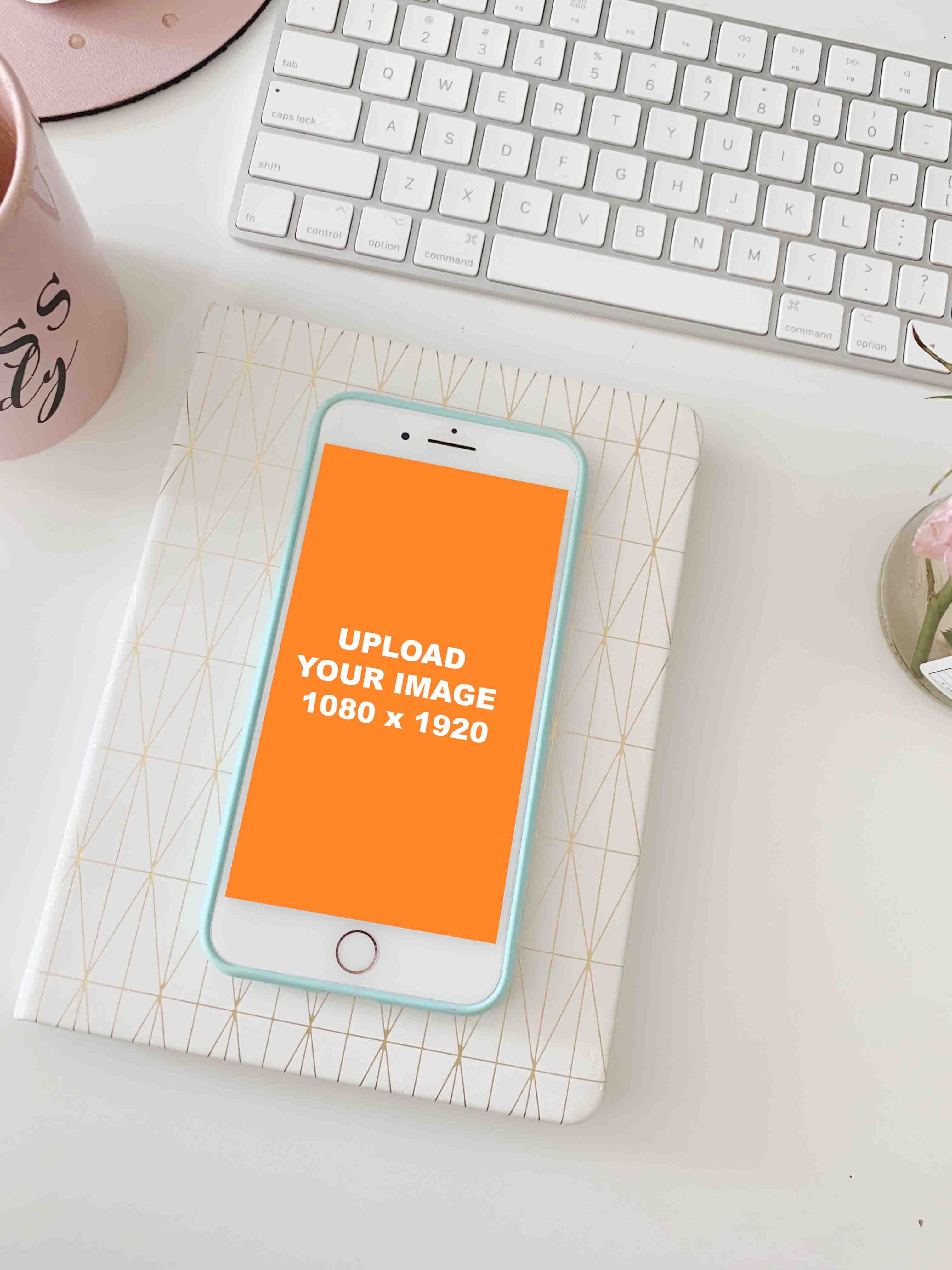 iphone mockup generator next to keyboard