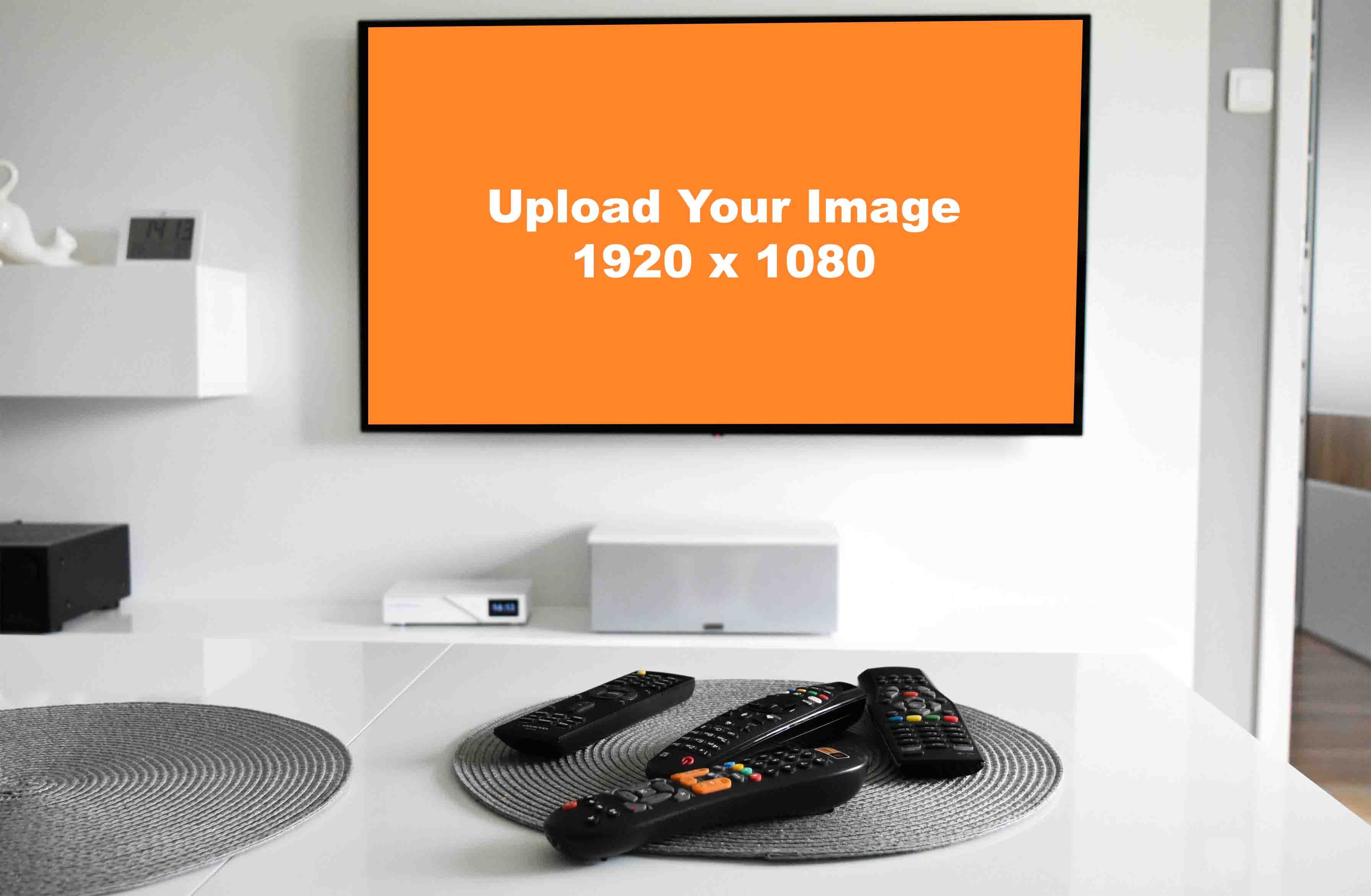 LED TV mockup on wall with remotes on table