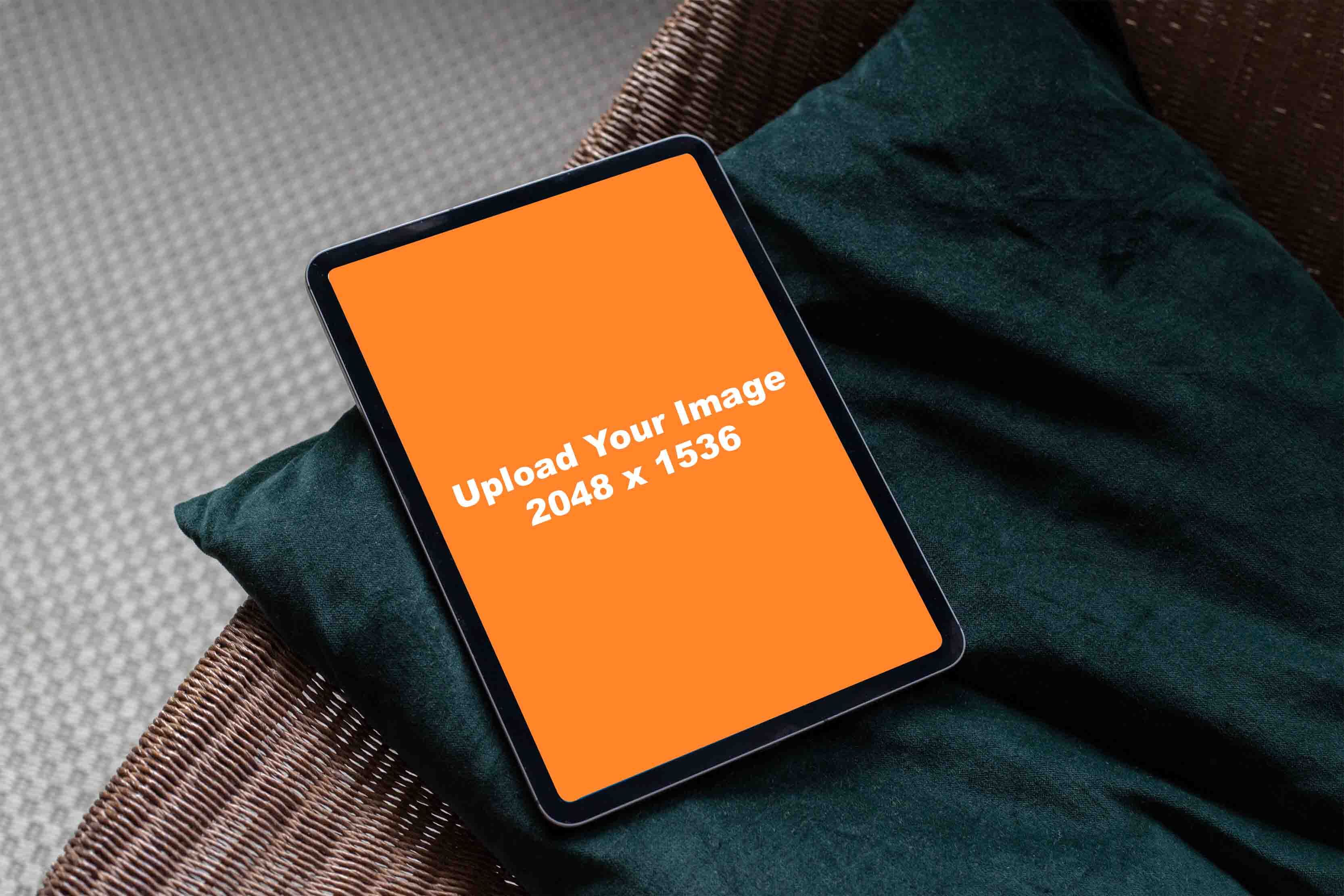 Mockup generator display on iPad on green pillow